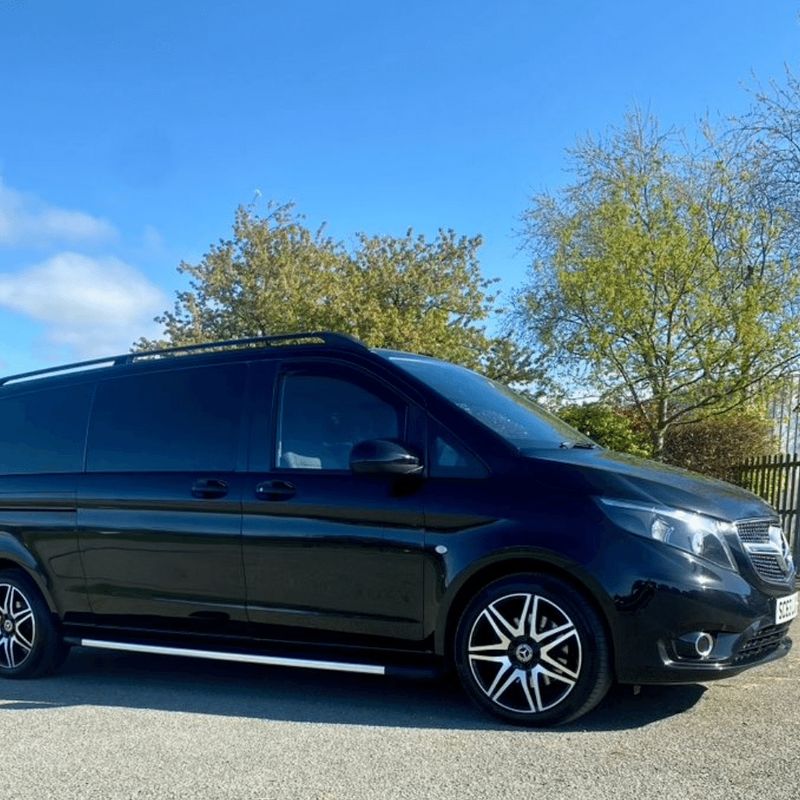 A black Mercedes Vito eight-seater